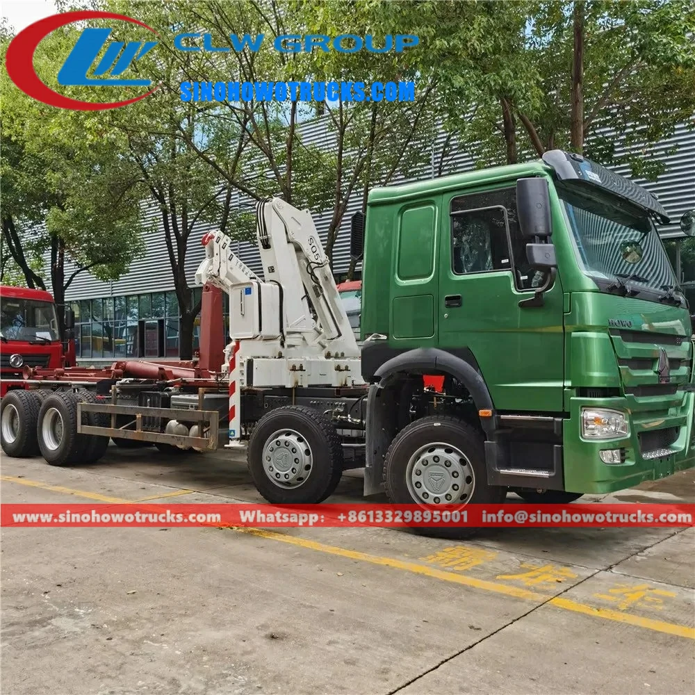 8x4 Sinotruk HOWO 25tons hooklift dumpsters with crane for sale