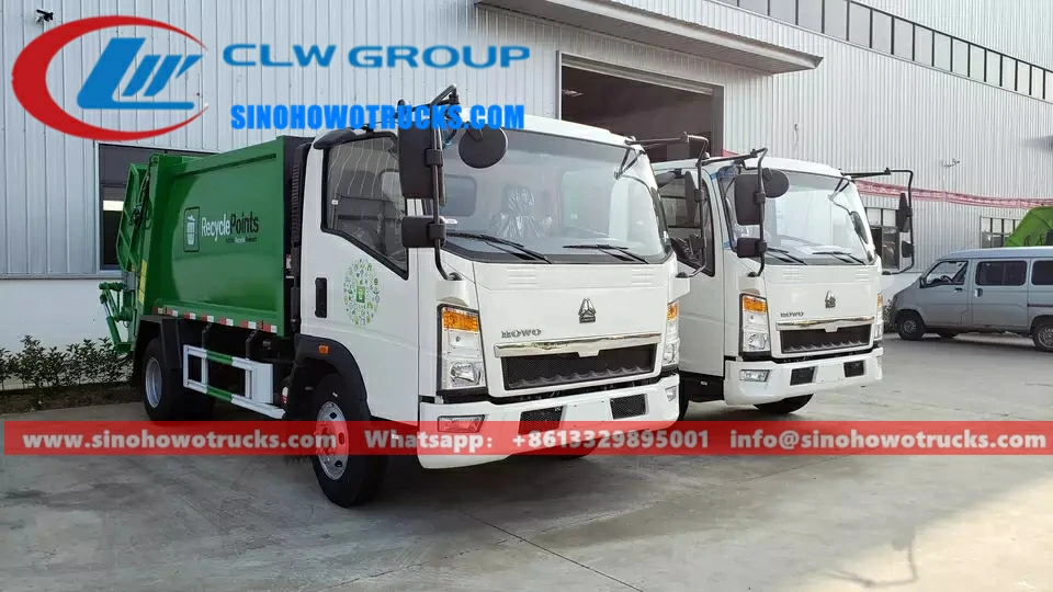 Right hand drive Sinotruck rubbish collection truck Papua New Guinea