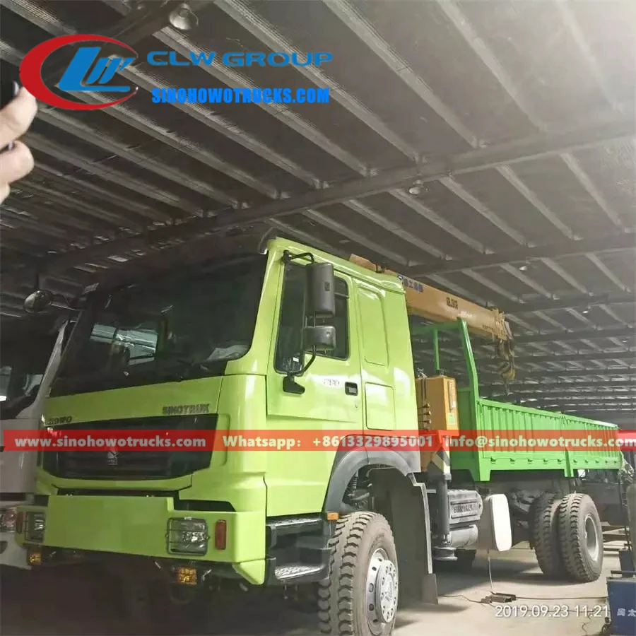 4WD Sinotruk Howo Forest off-road crane carrier truck Saudi Arabia